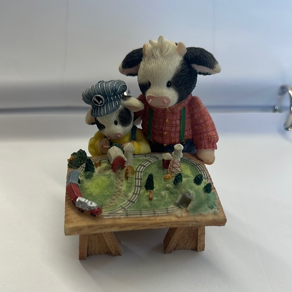Cow Figurine with Train Set
